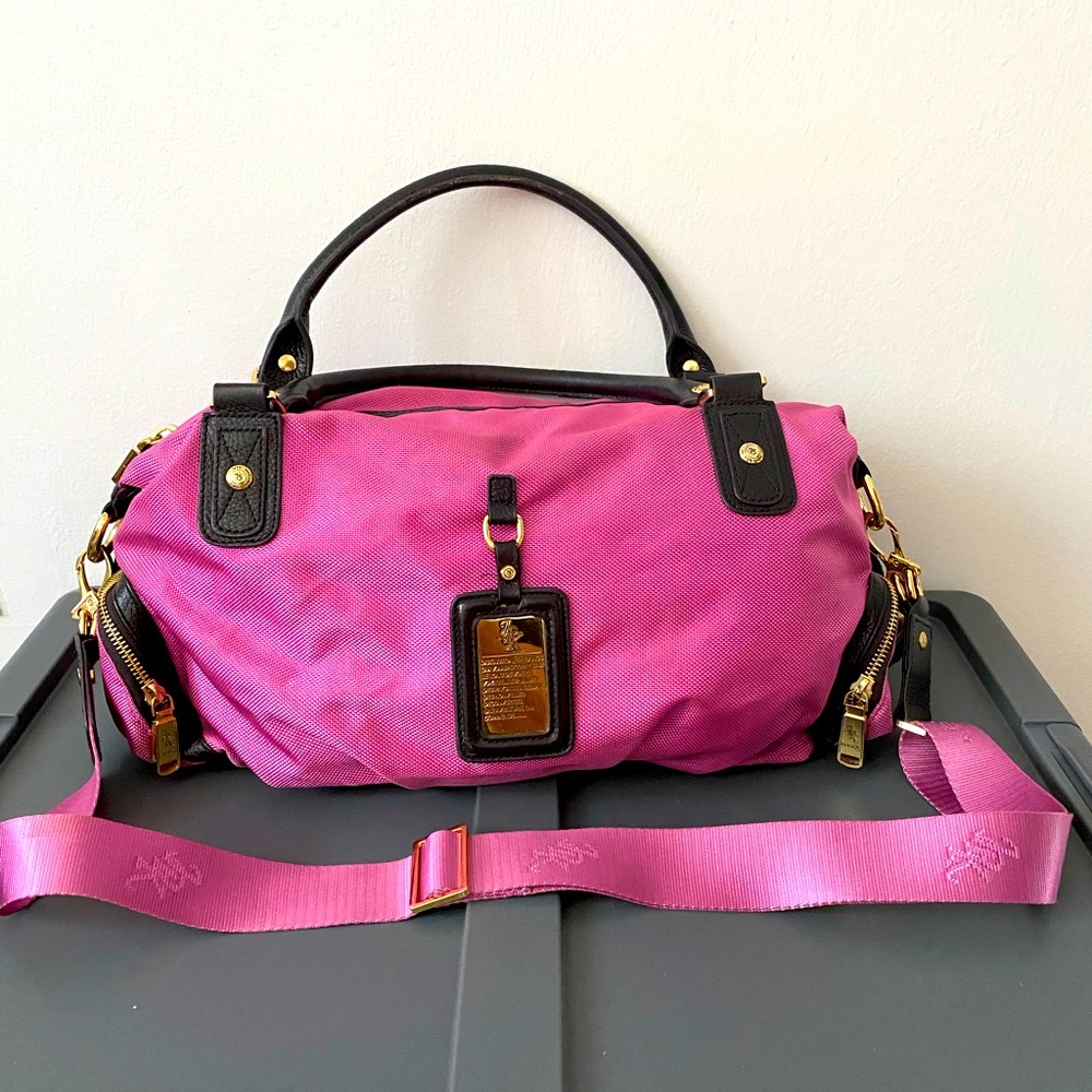 Pink satchel bag.